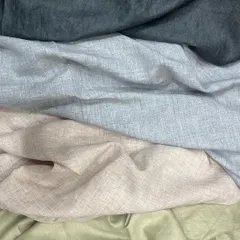 A selection of our pure linen fabrics in an array of neutral and earthy tones. This breathable fabric is ideal for creating comfortable yet stylish summer suits and ethnic wear.