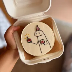 I get a lot of requests for funny meme cakes. This bento features the popular Flork meme character holding a tiny birthday cake, perfect for a friend with a good sense of humor.