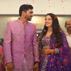 For this beautiful reception, we went with a glamorous yet elegant look. The soft waves and radiant makeup perfectly matched her stunning purple lehenga, creating a memorable style for her special evening.