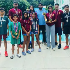 The results from just three weeks of competition: 3 trophies, 67 medals, and countless personal bests. This group photo captures the success of my swimmers at the Gurugram and State swim meets.