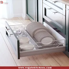 Our drawer solutions are designed for real-life use. This deep drawer features custom dividers for plates and bowls, keeping them secure and preventing chipping. The smooth, full-extension runners provide easy access.