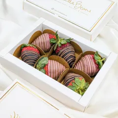 The perfect gift for any occasion, our chocolate-coated strawberries come in a beautiful white and gold foil box.