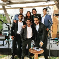 A group shot from a Christmas gig. We love playing festive events and bringing our energy to holiday celebrations.