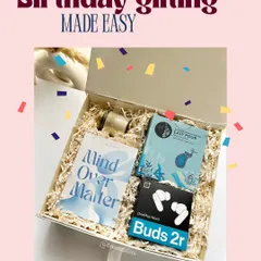 A wellness-themed birthday hamper for an employee. It includes a "Mind Over Matter" journal and OnePlus earbuds, promoting work-life balance and showing you care about their well-being.