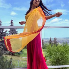 Feeling free and expressive in this vibrant lehenga. This photo captures the joy and energy that dance brings into my life.