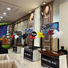 It's not just about decor, it's about the fun. I set up themed game booths like 'Fast Lane Balance' and 'Balancing Disc' to keep the kids entertained at this racing party.