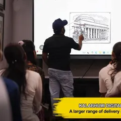 An instructor demonstrates architectural drawing techniques on a digital board. This advanced study method allows for clear, large-scale examples that the entire class can follow, which is essential for mastering perspective.
