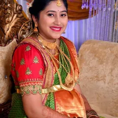 A happy smile from my client at her baby shower. I focused on a bright, festive look with a bold red lip and glowing skin to match the celebratory mood of her seemantham ceremony.
