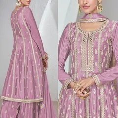 I love this onion pink Chinon silk palazzo suit for its soft, feminine vibe. The heavy thread and sequin work on the top makes it a standout piece for any festive occasion.