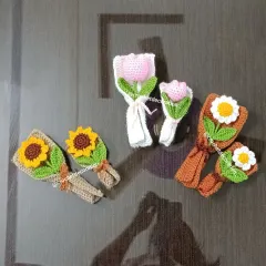 Our mini and XS bouquets laid out to show the different sizes and flower types available, including sunflower, tulip, and daisy.