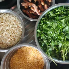 The basics of so many of my mother's recipes. Freshly chopped garlic, ginger, coriander, and lentils form the 'vatan' or paste that is the base of many Maharashtrian curries.