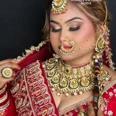 A close-up of a traditional bridal makeup look. Students learn to master the art of classic Indian bridal makeup, including bold eyes, defined lips, and working with heavy jewelry.