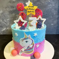 This vibrant unicorn cake is a fantasy come to life, complete with colorful frosting, stars, and lollipops. It’s a perfect centerpiece for a magical third birthday party.