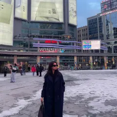 A winter shot in downtown Toronto's Dundas Square. This shows my ability to create compelling urban content even in cold weather, capturing the energy of the city.