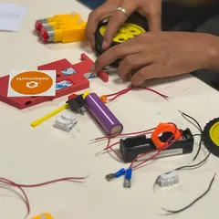 Another shot of the organized chaos of our workshop table. The laughter and teamwork during the parent-child sessions were infectious.