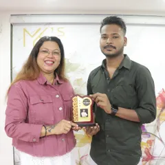 Celebrating a student's achievement. This token of appreciation is for his hard work and dedication during the course.