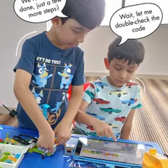 Teamwork makes the dream work. Here, young innovators collaborate, combining their skills in building and coding to solve challenges together at our Bangalore summer camp.