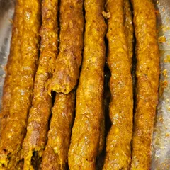 A close look at my freshly prepared Mutton Seekh Kebabs. They are juicy, full of spices, and perfect as a starter for any event.