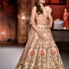 On the runway, every detail matters. Here, I captured actress Kriti Sanon in a full-length shot, showcasing the intricate embroidery and graceful flow of her stunning lehenga.