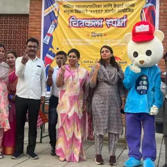With officials and the event mascot at the voting awareness painting competition. I am always glad to contribute my skills for community initiatives.