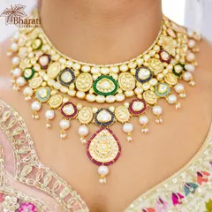 A bride adorned in our custom Kundan and pearl jewellery. We specialize in exclusive bridal consultations to create a complete, harmonious look that complements your attire and captures the essence of your personal story on your most important day.