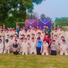 A group photo of our cricket team, united and proud after a successful tournament.