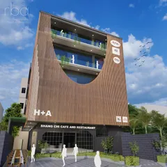 For this boutique commercial building, we designed a distinctive facade using terracotta fins. The sweeping curve is not just an aesthetic choice; it strategically manages privacy and sunlight for the cafe and offices within, proving that even smaller buildings can make a bold statement.