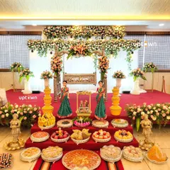 I handle traditional ceremonies with care and attention to detail. This naming ceremony stage features a beautifully decorated floral cradle, traditional dolls, and an array of offerings, creating a perfect blend of celebration and custom.