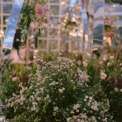 A close-up of the dreamy fresh florals surrounding the contemporary mirrored mandap we designed. Every flower is intentionally placed to create a soft, romantic, and immersive garden feel.