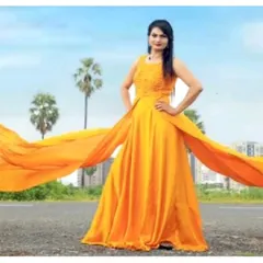 Gorgeous glamour for every frame. Our client looks beautiful in this flowing yellow gown, perfect for a pre-wedding photoshoot.