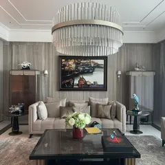 For this apartment in DLF The Camellias, we created a serene living space with a neutral wall palette as a backdrop for contemporary furniture and art. The design reflects the client's globe-trotting lifestyle and preference for chic, understated interiors.