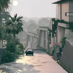 A view of the Moira Homes development, showing how the structures are nestled into the sloping terrain. The angled forms and earthy materials help the buildings merge with the wet, tropical landscape of Goa.