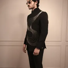 A side profile of the 'Illusion Silver Lines' piece, highlighting how the intricate embroidery wraps around the body for a dynamic and flattering effect.
