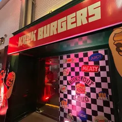 The vibrant entrance to the Krok Burgers launch at Forum Rex Walk. We designed and installed the retro-themed decor, including the checkered backdrop and neon-style signage, to create a fun and immersive brand experience.