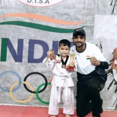 I don't just train students, I build champions. Here is one of my youngest champs with his first trophy and medal after a big win. His journey is just beginning.
