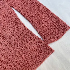 A close-up of the beautiful star stitch on the Etoile Sweater's sleeve. I put a lot of love into getting these details just right, ensuring every handmade piece is special and high-quality.