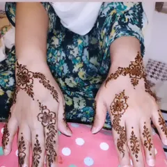 A light and airy design with simple floral elements, perfect for someone trying henna for the first time.
