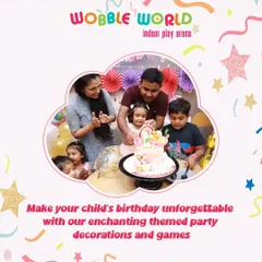 A unicorn-themed birthday party in full swing. The birthday girl and her family are all smiles as they get ready to cut the enchanting themed cake.