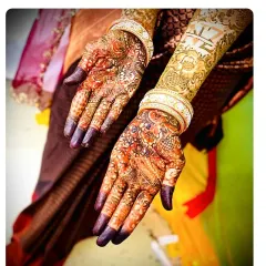 A closer look at the personalized initials 'ZN' after the henna stain has matured. It's a beautiful, subtle secret that is part of your bridal story.