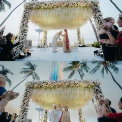 The perfect beach wedding mandap, set against the open sky and swaying palm trees. This shot captures the scale and beauty of a destination ceremony, where the natural environment becomes an integral part of the wedding decor and memories.