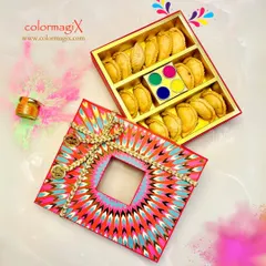A closer look at our stunning Holi Gujiya box. The intricate design and festive colors make it a beautiful gift, while the delicious gujiyas inside are a treat for the taste buds.