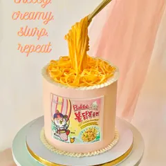 A stylized shot of the cheesy ramen cake, perfect for sharing.