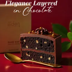 Elegance layered in chocolate. This slice showcases the perfect balance of moist chocolate cake with crunchy nuts, offering a sophisticated texture and deep cocoa flavor in every bite.
