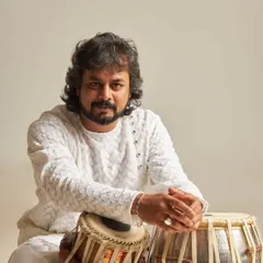 A relaxed portrait with my tabla. This photo reflects my calm and approachable nature, which I hope comes through in my music and collaborations.