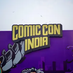 The official Comic Con India sign, a simple but essential shot for establishing the event's brand and location.