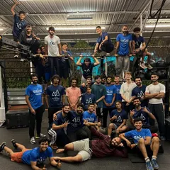More than just a gym, we are a family. This photo from our U.N.I.T.E event captures the incredible energy and camaraderie of our members. This is what our community is all about.
