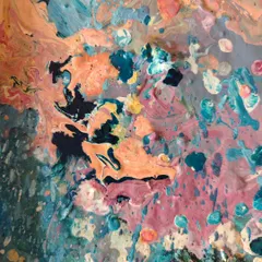 The beautiful, chaotic mess of color on a palette. This is where choices are made and ideas begin to take shape, a perfect reflection of the creative process.