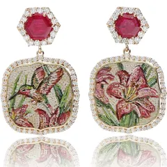 I love designing asymmetrical earrings that tell a story. This pair, named "The Promise of Eden," features a hummingbird on one side and a lily on the other, both crafted in micromosaic and set with a halo of diamonds and hexagonal rubies.
