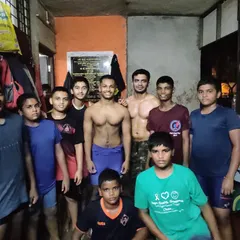 A group of our young and aspiring pailwans at the akhada. We are proud to be shaping the next generation of wrestlers, instilling values of hard work and respect.