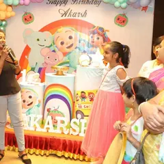 Our emcee leading party games and activities. We help keep the energy high and the children entertained throughout the celebration.
